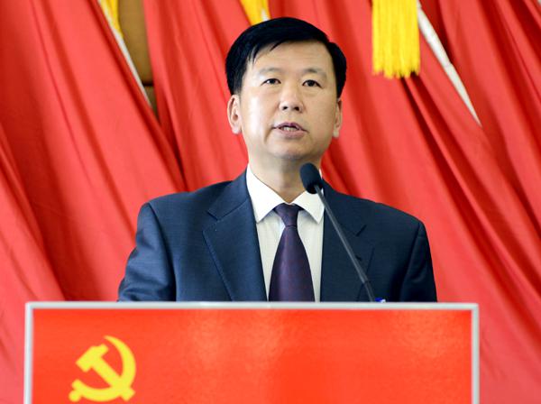 郑永奎同志介绍大会筹备工作情况___.jpg
