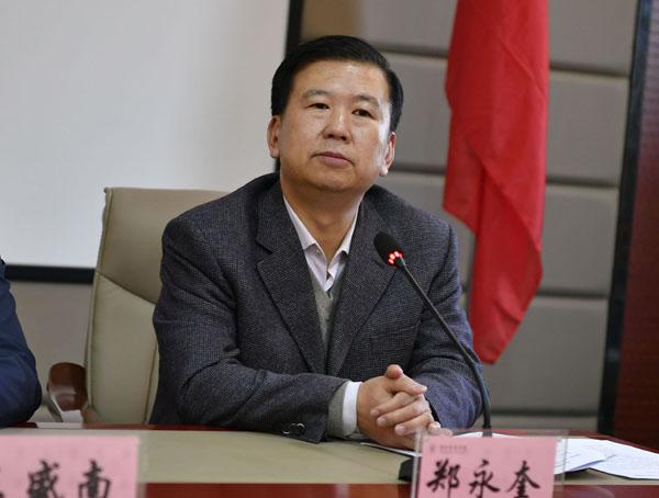 学校党委书记郑永奎作工作报告__.jpg